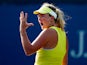 Coco Vandeweghe of the United States reacts against Donna Vekic of Croatia during her women's singles first round match on Day Two of the 2014 US Open at the USTA Billie Jean King National Tennis Center on August 26, 2014
