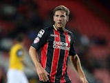 Dan Gosling of AFC Bournemouth in action during the Capital One Cup Second Round match between AFC Bournemouth and Northampton Town at Goldsands Stadium on August 26, 2014 
