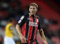 Dan Gosling of AFC Bournemouth in action during the Capital One Cup Second Round match between AFC Bournemouth and Northampton Town at Goldsands Stadium on August 26, 2014 