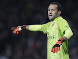 Arsenal's Colombian goalkeeper David Ospina gestures during the English League Cup third round football match between Arsenal and Southampton at The Emirates Stadium in London on September 23, 2014