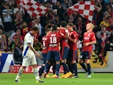 Lille's Belgium forward Divock Origi is congratuled by his teammates after scoring a goal during the French L1 football match Lille vs Bastia on September 27, 2014
