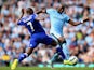 Eliaquim Mangala of Manchester City competes with Ramires of Chelsea during the Barclays Premier League match between Manchester City and Chelsea at the Etihad Stadium on September 21, 2014