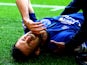 Kevin Mirallas of Everton pulls up with a hamstring injury during the Barclays Premier League match between Liverpool and Everton at Anfield on September 27, 2014
