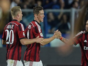 Torres inspires Milan comeback