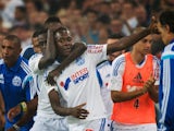 Marseille's French midfielder Giannelli Imbula (C) celebrates with teammates after scoring a goal during the French L1 football match against Saint-Etienne on September 28, 2014