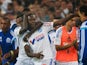 Marseille's French midfielder Giannelli Imbula (C) celebrates with teammates after scoring a goal during the French L1 football match against Saint-Etienne on September 28, 2014