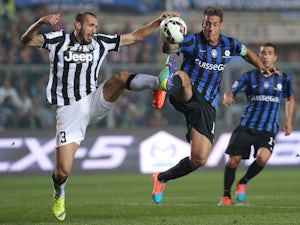 Tevez gives Juventus interval lead