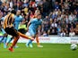 Abel Hernandez of Hull City scores from the penalty spot during the Barclays Premier League match between Hull City and Manchester City at KC Stadium on September 27, 2014