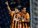 Tom Ince of Hull City congratulates Robbie Brady on his goal during the Capital One Cup Third Round match between West Bromwich Albion and Hull City at The Hawthorns on September 24, 2014