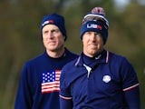 Jim Furyk (L) and Hunter Mahan of the United States watch from the 7th tee during the Morning Fourballs of the 2014 Ryder Cup on the PGA Centenary course at Gleneagles on September 27, 2014