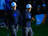 Jimmy Walker (L) and Rickie Fowler of the United States line up a putt on the 3rd hole during the Morning Fourballs of the 2014 Ryder Cup on the PGA Centenary course at Gleneagles on September 26, 2014