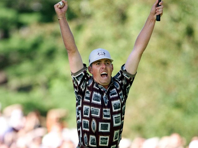 US Ryder Cup team member Justin Leonard celebrates his putt against Jose Maria Olazabal of Spain on the 17th hole that clinched the victory for the US in the 33rd Ryder Cup 26 September, 1999