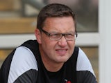 Leyton Orient assistant manager Kevin Nugent looks on prior to the Pre-Season Friendly match between Northampton Town and Leyton Orient at Sixfields Stadium on July 26, 2014