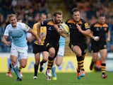 Rob Miller of Wasps on his way to scoring a try during the Aviva Premiership match between Wasps and Newcastle at Adams Park on September 28, 2014