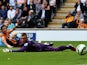 Edin Dzeko of Manchester City scores his team's third goal past Allan McGregor of Hull City during the Barclays Premier League match between Hull City and Manchester City at KC Stadium on September 27, 2014 