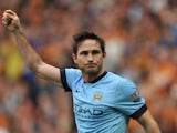 Manchester City's English midfielder Frank Lampard celebrates scoring their fourth goal during the English Premier League football match between Hull City and Manchester City at the KC Stadium in Kingston-Upon Hull on September 27, 2014