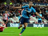 Marc Muniesa of Stoke City (R) celebrates after scoring their first goal during the Capital One Cup Third Round match against Sunderland on September 23, 2014