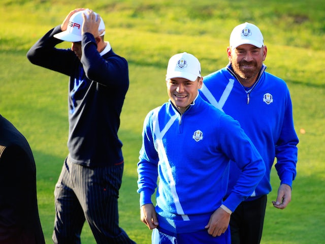 Martin Kaymer and Thomas Bjorn of Europe walk onto the 1st during the Morning Fourballs of the 2014 Ryder Cup on the PGA Centenary course at Gleneagles on September 26, 2014