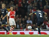 Southampton's English defender Nathaniel Clyne (R) shoots to score their second goal during the English League Cup third round football match against Arsenal on September 23, 2014