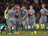 Emmanuel Riviere of Newcastle is mobbed by team mates after scoring during the Capital One Cup Third Round match between Crystal Palace and Newcastle United at Selhurst Park on September 24, 2014