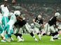 Sebastian Janikowski #11 of the Oakland Raiders adds the extra point to the touchdown scored by teammate Brian Leonhardt #87 of the Oakland Raiders during the NFL match between the Oakland Raiders and the Miami Dolphins at Wembley Stadium on September 28,