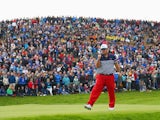 Patrick Reed of the United States celebrates on the 8th green during the Singles Matches of the 2014 Ryder Cup on the PGA Centenary course at Gleneagles on September 28, 2014