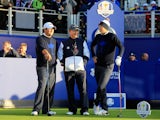 USA trio Patrick Reed, captain Tom Watson and Jordan Spieth look on from the 1st tee during the Morning Fourballs of the 2014 Ryder Cup on the PGA Centenary course at Gleneagles on September 26, 2014