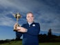 Team Europe captain Paul McGinley poses with the Ryder Cup ahead of the contest against the USA at Gleneagles on September 23, 2014