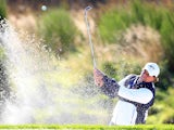 Phil Mickelson of the United States plays from a bunker on the 9th hole during the Morning Fourballs of the 2014 Ryder Cup on the PGA Centenary course at Gleneagles on September 26, 2014
