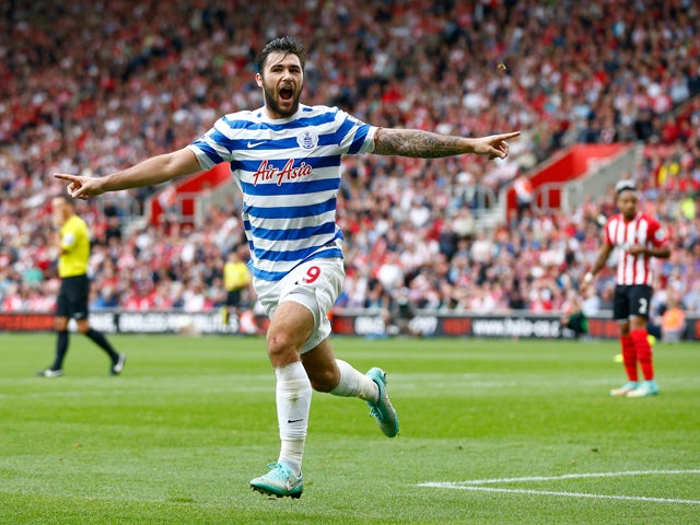 Charlie Austin of QPR celebrates scoring their first goal during the Barclays Premier League match between Southampton and Queens Park Rangers at St Mary's Stadium on September 27, 2014