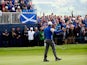 Rory McIlroy of Europe celebrates his putt on the 6th green during the Singles Matches of the 2014 Ryder Cup on the PGA Centenary course at Gleneagles on September 28, 2014