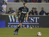 Ryan Mason #38 of Tottenham Hotspur looks to pass during the second half against the Chicago Fire at Toyota Park on July 26, 2014