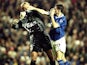 Sander Westerveld of Liverpool wrestles with Francis Jeffers of Everton during the FA Premier League match between Liverpool and Everton at Anfield on September 27, 1999