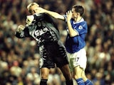 Sander Westerveld of Liverpool wrestles with Francis Jeffers of Everton during the FA Premier League match between Liverpool and Everton at Anfield on September 27, 1999