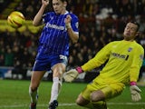 Stuart Nelson of Gillingham saves the shot from Alan Judge of Brentford during the Sky Bet League One match between Brentford and Gillingham at Griffin Park on January 24, 2014