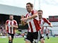 Strike pair released by Brentford