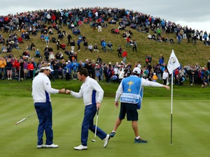 McDowell, Dubuisson in full control