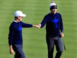 Zach Johnson (L) and Hunter Mahan of the United States celebrate winning the hole on the 4th during the Afternoon Foursomes of the 2014 Ryder Cup on the PGA Centenary Course at Gleneagles on September 26, 2014