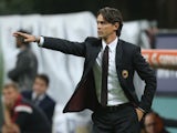 Head coach of Milan Filippo Inzaghi gestures during the Serie A match between AC Milan and AC Chievo Verona at Stadio Giuseppe Meazza on October 4, 2014