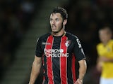 Adam Smith of AFC Bournemouth in action during the Capital One Cup Second Round match between AFC Bournemouth and Northampton Town at Goldsands Stadium on August 26, 2014 