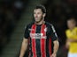 Adam Smith of AFC Bournemouth in action during the Capital One Cup Second Round match between AFC Bournemouth and Northampton Town at Goldsands Stadium on August 26, 2014 