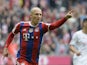 Bayern Munich's Dutch midfielder Arjen Robben celebrates scoring the 2-0 goal during the German first division Bundesliga football match FC Bayern Munich vs Hanover 96 at the Allianz Arena in Munich, southern Germany on October 4, 2014