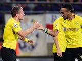 Dortmund's Ciro Immobile celebrates with Pierre-Emerick Aubameyang after scoring a goal during the UEFA Champions League football match RSC Anderlecht vs Borussia Dortmund in Brussels, on October 1, 2014