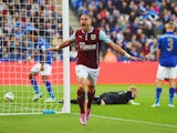 Michael Kightly of Burnley celebrates as he scores their first goal during the Barclays Premier League match between Leicester City and Burnley at The King Power Stadium on October 4, 2014