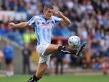 Conor Coady of Huddersfield during Sky Bet Championship match between Huddersfield Town and Charlton Athletic at Galpharm Stadium on August 23, 2014