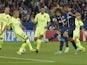 Paris' Brazilian defender David Luiz (3rdR) scores a goal during the UEFA Champions League football match Paris Saint-Germain (PSG) vs Barcelona (FCB) on September 30, 2014