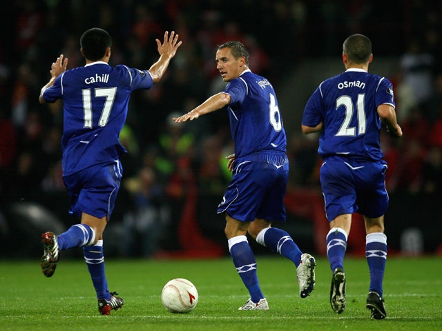 Everton's Philip Jagielka celebrates scoring his teams first goal with Tim Cahill during the UEFA Cup first round, second leg match, between Standard Liege and Everton at Stade Maurice Dufrasne, on October 2, 2008