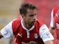 Kari Arnason (L) of Rotherham United in action against Leicester City on August 5, 2014