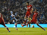 Kazenga LuaLua of Brighton shoots during the Sky Bet Championship match between Brighton & Hove Albion and Cardiff City at Amex Stadium on September 30, 2014
