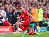 Jordan Henderson of Liverpool celebrates scoring their second goal during the Barclays Premier League match between Liverpool and West Bromwich Albion at Anfield on October 4, 2014